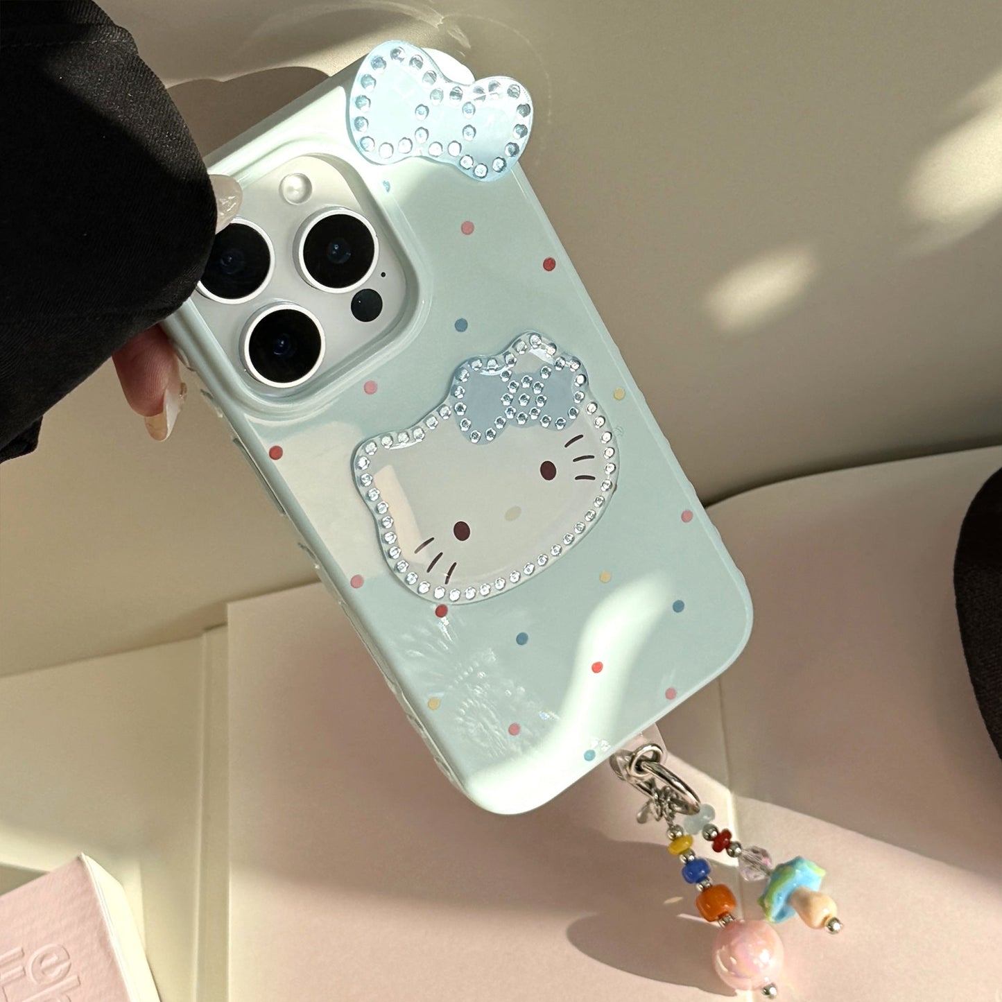 Three-dimensional gilt is suitable for 17promax Apple 16 mobile phone case iphone14 color polka dot bow cat 13 pendant.